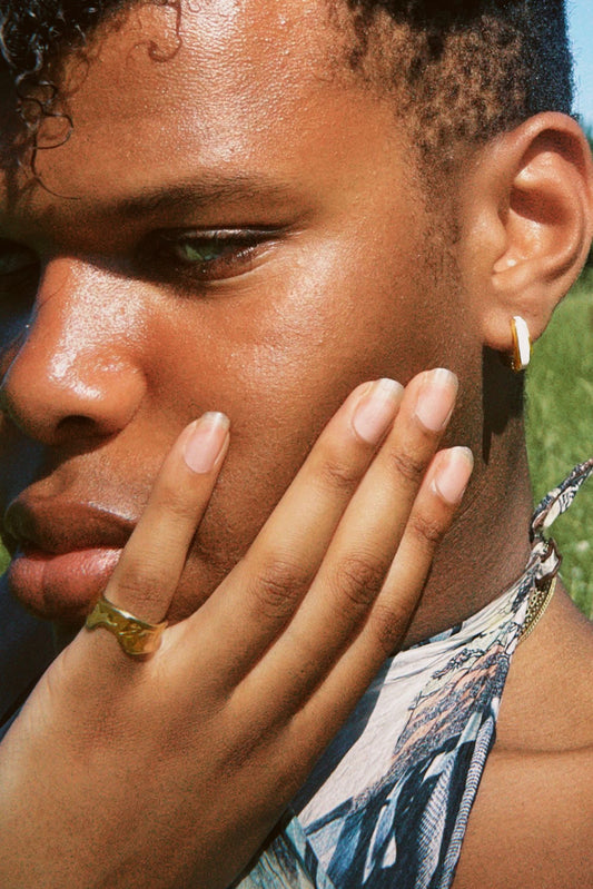 Geometric pearl-inlay-style pair of huggy earrings