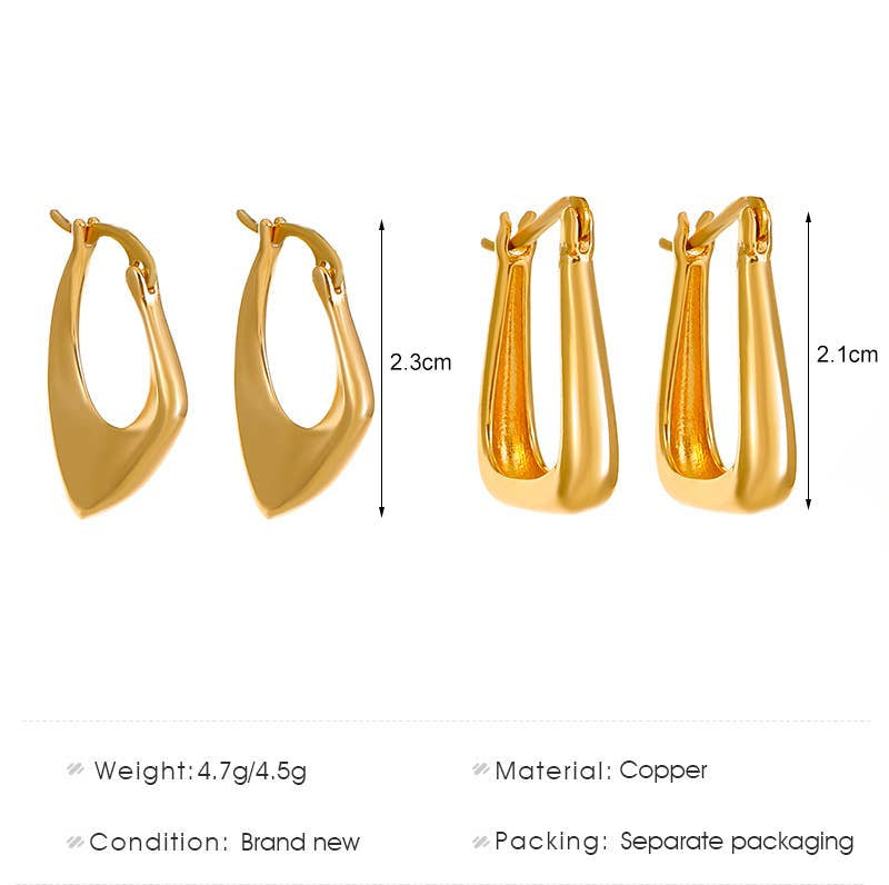 Gold asymmetrical huggie pair of earrings